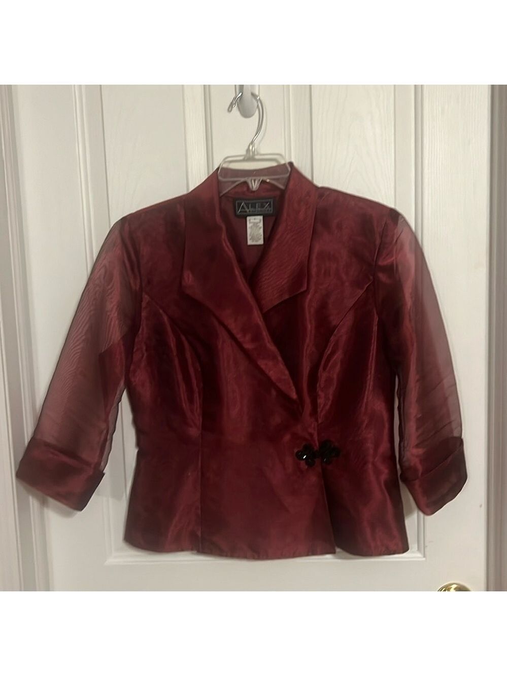Alex Evenings jacket,lined bodice, sheer 3/4 length sleeves,shoulder pads.Size L